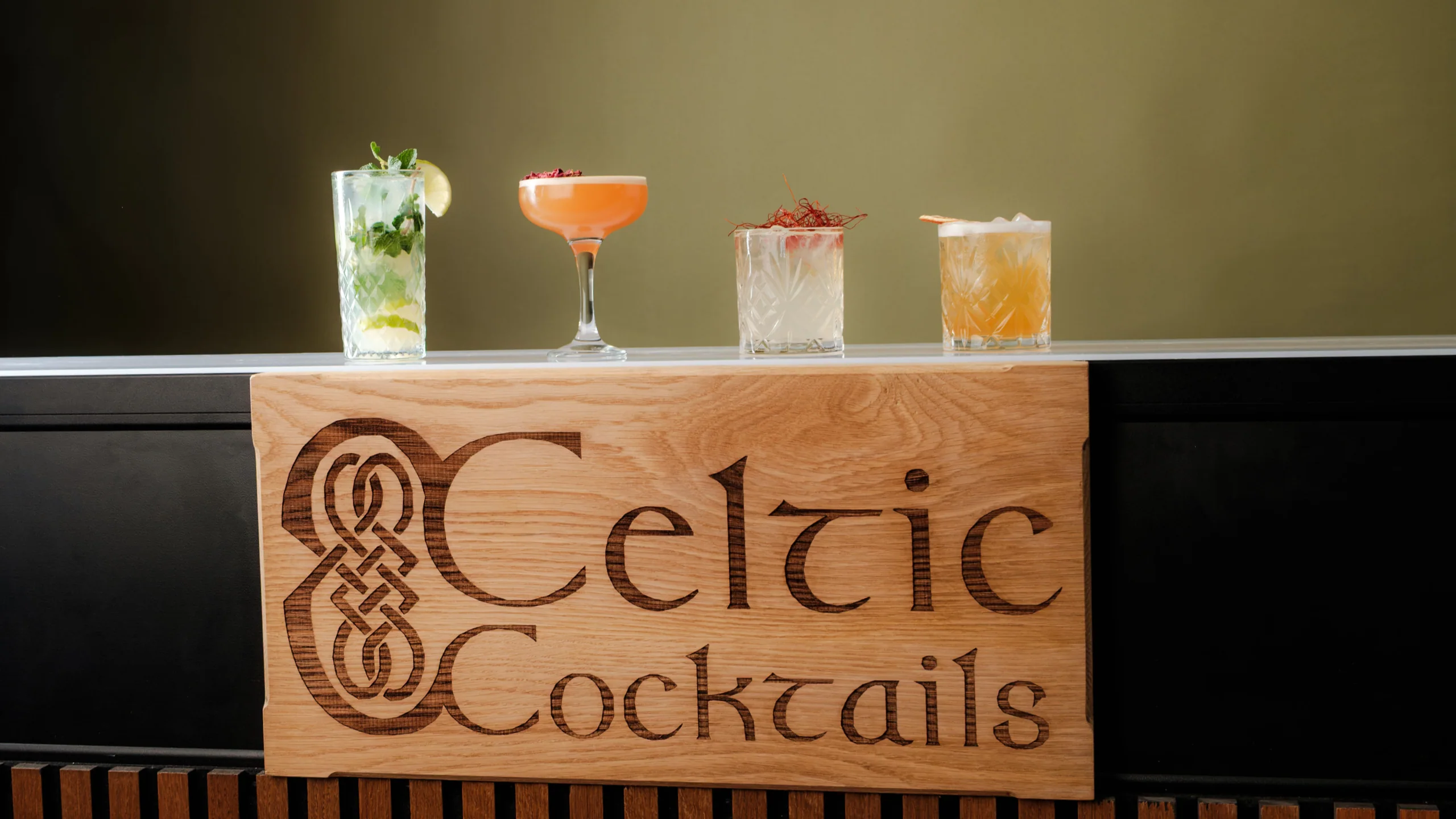The Celtic Cocktails bar set up, four cocktails along the top